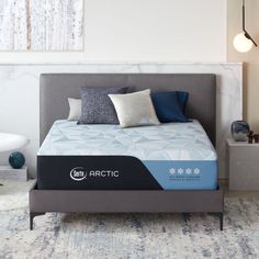 the arctic mattress is made up and ready to be used as a bed in a bedroom