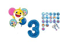 the number 3 balloon and other items are shown in front of a white background with an image of a shark on it