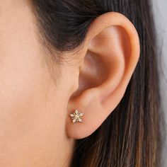 Height: 7.3mm

Width: 7.3mm

Thickness: 1.4mm



Stone material: clear cubic zirconia

Stone shape: round

Total number of CZ stones: 12

Stone setting: prong



Metal: solid 14k yellow gold

Finish: high polish 1 Gram Gold Earrings For Daily Use, Diamond Ear Rings Studs, Small Diamond Studs, 7 Stones Ear Rings, Small Stone Earrings, Gold Stud Designs, Diamond And Gold Earrings, Gold Small Earrings Designs, Simple Gold Earings