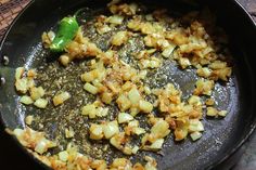 the food is being cooked in the skillet on the stove top, ready to be eaten