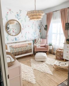 a baby's room decorated in pastel colors with cactus wallpaper and rugs