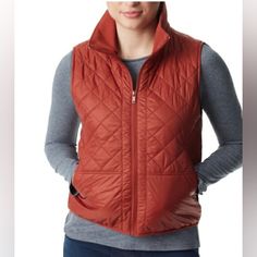 This Bass Outdoor Women's Vest Is Perfect For The Outdoorsy Type. The Quilted Design Adds A Touch Of Style, While The Burnt Henna Color Gives It A Unique And Trendy Look. The Vest Is Made Of Nylon Material, Ensuring Durability And Comfort. It Features A Zip Front Closure And Sleeveless Design, Making It Perfect For Layering Over A Tank Top Or Shirt. Whether You're Hiking In The Mountains Or Running Errands Around Town, This Vest Is Sure To Become A Staple In Your Wardrobe. Retails For $79 Henna Color, Outdoor Vest, Kids Trend, Mens Trends, Quilted Vest, Sleeveless Vest, Women Trends, G H, In The Mountains