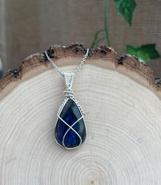 Dark Blue Labradorite wrapped with Silver wire strung on a Sterling Silver 18" chain Spring City, Labradorite Necklace, Crystal Necklaces, Labradorite Necklaces, Christmas Deals, Blue Labradorite, Silver Wire, Sterling Silber, Crystal Necklace