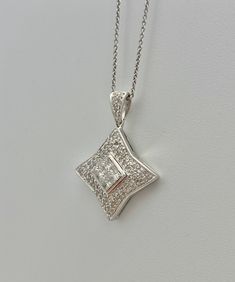 "Pacific Jewelry Presents, Star shape pendant with VS2 natural micro-set diamonds mounted in 18k solid white gold. Diamond weight (0.80 carats) is divided into 0.50 carats of princess cut center stones and 0.30 carats of adorning micro-pave diamonds. I really love this pendant, it's really so cute and sleek and the diamonds are all excellent/ideal cut diamonds for optimal sparkle and shine. Message me for certificate of appraisal with order. <> ✔ Natural, genuine diamonds ✔ Option to purch Luxury White Gold Star-shaped Diamond Necklace, Luxury Star-shaped White Gold Diamond Necklace, Fine Jewelry Diamond Necklace With Princess Cut, Princess Cut Diamond Necklace Fine Jewelry, White Gold Diamond Necklace With Princess Cut, Brilliant Cut Princess Diamond Necklace, Diamond White Princess Cut Diamond Necklace As Gift, Gift Princess Cut Diamond White Necklace, Princess Cut Diamond White Necklace For Gift