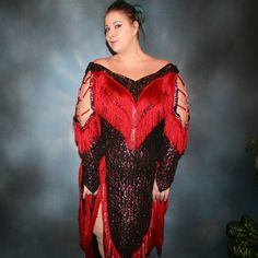 will fit size 13/14-19/20, very stretchy This stunning plus size Latin-rhythm dress was crafted from luxurious black glitter slinky stretch fabric adorned with a gorgeous oriental floral design. Lush red and soft pink accents bring this dress to life, along with luxurious rose and red Siam Swarovski rhinestone work details, as well as extensive hand beading of ruby and light pink Swarovski crystal beads throughout the chainette fringe and in the shoulder opening of the elegant long cold shoulder Red Sequined Flapper Dress For Party, Red Sequined Flapper Dress For Evening, Fitted Red Sequin Flapper Dress, Fitted Red Flapper Dress With Sequins, Fitted Red Flapper Dress For Parties, Red Fitted Flapper Dress For Parties, Red Fitted Flapper Dress For Evening, Fitted Red Flapper Dress For Evening, Fire Flower