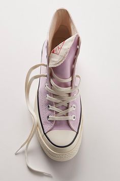 Your favorite classic Converses featured in the brand’s iconic high-top silhouette, now in a sustainable design crafted with recycled canvas materials. * Lace-up * Lined interior * Padded footbed | Chuck 70 Recycled Canvas Hi-Top Sneakers by Converse at Free People in Purple, Size: US 6 M Light Purple Sneakers, Aesthetic Converse, Accesorios Aesthetic, Color Board, Shoe Wishlist, Purple Sneakers, Buy List, Converse Chuck 70, Recycled Canvas