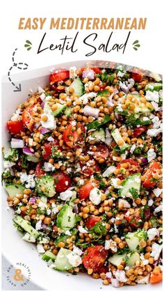 a salad with cucumber, tomatoes and feta cheese on top in a white bowl