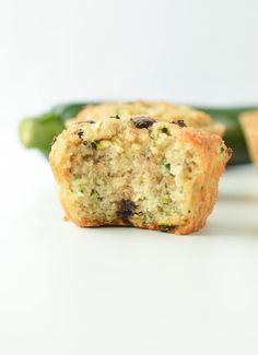 two muffins sitting next to each other on top of a white countertop