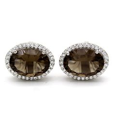 "Product description: Product Type - Cufflinks Metal Type - 925 Sterling Silver (High Quality Polishing & Finishing) Gemstone - Natural Smoky Topaz Gemstone Size - 12X10 MM Gemstones Shape - Oval Accent Stone - Cubic Zircon (AD) Gemstone color - As Picture Gemstone Purity - 100% Natural (Guaranteed) Standard Shipping - 3 to 7 Days ($30 Extra) Economy Shipping - 10 to 20 Days (Free Worldwide) Please Note - Color in the picture may be slightly different from the actual product. Due to photogra Sterling Silver Cufflinks For Formal Wear, Classic Formal Earrings With Accent Stones, Classic Oval Silver Cufflinks, Formal White Gold Earrings With Accent Stones, Elegant Oval Cufflinks For Formal Occasions, Elegant Oval Cufflinks For Anniversary, Classic Silver Oval Cufflinks, Silver Oval Cufflinks Gift, Silver Oval Cufflinks As Gift