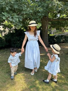 Handmade with love from a mother of two children.  Let's collect beautiful moments together with this matching dress.  Mother and Daughter and Son Mama Bella Blue Gingham Dress is a full skirt tie back with lace trim embroidery and a ruffled straps top off the soft shape of this midi dress. A perfect dress for everyday look or even a special occasion.  FIT: One Size (Chest 34-39 inches. Waist 25-34 inches. Length from waist 32 inches.) Materials and Care : 100% cotton, Lined.   Machine wash cold Blue Matching Set Dress For Spring, Family Matching Summer Dresses, Dress Mother And Daughter, Mommy Son Outfits, Collect Beautiful Moments, Son Outfits, Trim Embroidery, Mommy Son, Dress For Everyday