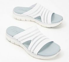 With a super-comfy upper and a footbed you'll want to sleep in, the Right Sheer slide sandal is the ultimate wear-everywhere sandal for all your daily to-dos this summer. From Skechers.