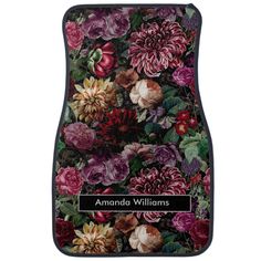 the personalized car mat with flowers and leaves in purple, red, pink and green