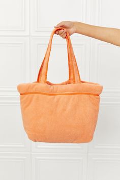 This beautiful orange tote is great for that extra pop of color. It is made of this super soft, plush material so it would also make a great beach/pool pillow. This bag features one zip pocket and one slip pocket inside. Type: Tote bag Bag size: Large Pattern type: Solid Material: 100% polyester Imported Product measurements: One size: 13 in*19 inBottom width: 4 inShoulder strap: 10 inEstablished in 2010 in LA, Fame Accessories supplies women from all walks of life with quality and affordable je Pool Pillow, Orange Tote Bags, Trendy Belts, Blue Zones, Affordable Jewelry, Beach Pool, Bag Bag, Blue Bags, Belt Bag