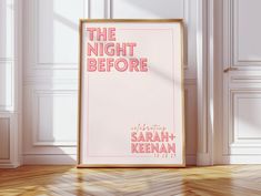 a pink poster with the words the night before on it in front of a white wall