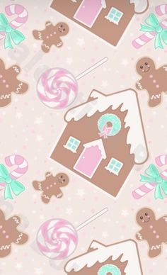 a gingerbread house with candy and lollipops on the side is shown