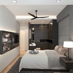 a bedroom with a bed and ceiling fan