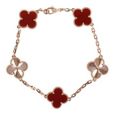 This Van Cleef & Arpels Vintage Alhambra 5 Motif bracelet is in 18K rose gold and Carnelian with a lobster clasp.Origin: FranceCondition: New and never wornAccompanied by: VCA green jewelry box, authenticity card, carebookMeasurements: Length: 7"| .5" x .5" Pendant Motif Van Cleef And Arpels Bracelet Stack Mulyi Clovers, Luxury Classic Jewelry With Hallmarks, Alhambra Van Cleef Earrings, Luxury Women's Jewelry With Hallmarks, Gold Vca Bracelet, Can Cleef Bracelet White, Vca Vintage Alhambra Bracelet, Van Cleef Alhambra Bracelet Rose Gold, Van Cleef Perlee Diamond Bracelet