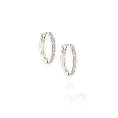 Radiant and elegant, the Juli Hoop Earrings offer a modern shape with glass crystal embellishments which make for a glamorous earring statement. Materials: 14K Gold Plated Brass Silver Plated Brass Glass Crystals Hypoallergenic and Nickel FreeSize:Available in two sizes: S: 1.2cm / 0.47"M: 1.5cm / 0.59"This item comes with a one-year warranty.Greeting card and/or gift receipt for exchange is available with purchase at checkout. Brass Glass, Crystal Embellishment, Glass Crystal, Gold Plated Silver, Silver Hoop Earrings, Pure Silver, Crystal Glass, Jewelry Care, Statement Earrings