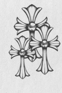 a drawing of three crosses with bows on the top and one cross at the bottom