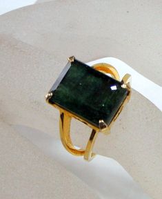 Vintage 18 K solid gold ring set with Natural Large Emerald. One of type collection piece in very good condition. USA ring size -7 ( we can adjust size), Size of Emerald-13.5/9.5 mm, weight-6.250 grams, material-18 K gold and natural Emerald. Formal Gold Rings With Emerald, Untreated Gold Sapphire Ring For Anniversary, Gold Hallmarked Ring For May Birthstone, Formal Gold Emerald Crystal Ring, Gold Emerald Cut Hallmarked Emerald Ring, Rectangular Gold Sapphire Ring Gift, Gold Rectangular Sapphire Ring For Anniversary, Rectangular Gold Emerald Ring, Gold Rectangular Sapphire Anniversary Ring