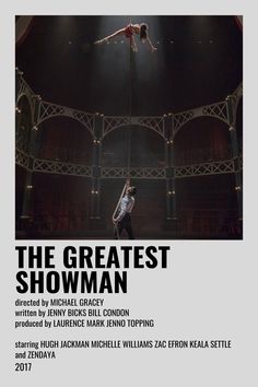 the greatest showman movie poster with two people on stilts in mid air above an audience