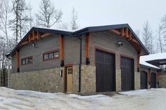 two garages are shown with snow on the ground