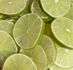 limes are cut in half and stacked on top of each other