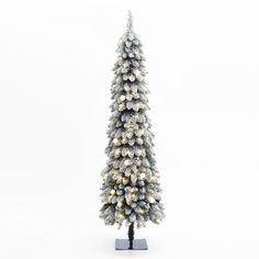 a small white christmas tree with lights on it