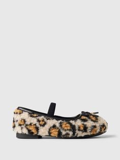 These ballet flats are made with a sherpa upper.  Rubber gripper sole.  Elasticized strap.  Bow tie detail at top.  Canvas lining.  Allover leopard print.  This product was made in a factory that invests in gender equality and women’s empowerment.  Through RISE Reimagining Industry to Support Equality) and Gap Inc. ’s program P. A. C. E.  Personal Advancement & Career Enhancement), we support people who make our clothes to build the skills, knowledge, confidence, and resilience needed to advance Pink Leopard Shoes, Pink Leopard Slides, Torrid Leopard Shoes, Leopard Ballet Flats, Asos Leopard Flats 7.5, Gender Equality, Support People, Baby Gap, Toddler Shoes