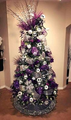 a decorated christmas tree with skulls and other decorations