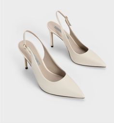 Modern White Slingback Pumps With 4-inch Heel, Cream Slingback Pumps With Pointed Toe And 4-inch Heel, Beige Pointed Toe Slingback Pumps With 4-inch Heel, Elegant Cream Slingback Pumps With 4-inch Heel, Chic Pointed Spring Court Shoes, Chic Spring Pointed Court Shoes, Spring Chic Pointed Court Shoes, Cream Kitten Heels With Sculpted Heel And Pointed Toe, Classic Cream Slingback Pumps With Ankle Strap