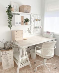 a white desk and chair in a room