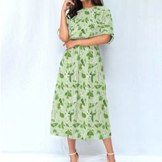 Experience effortless style with our Women Maxi Dress! This beautiful dress features a green floral design, a comfortable elastic waist, pockets, and short sleeves. Perfect for any spring or summer occasion, this ankle-length boho dress combines fashion and comfort. Fabric: Four-way stretch (95% polyester and 5% spandex) With pockets and short sleeves Regular fit; This product is nonelastic Elastic waist dress Fabric weight: 120g/m² Care Instruction: machine wash cold with similar colors, do not Green Printed Maxi Floral Dress, Green Printed Midi Dress For Garden Party, Garden Party Green Printed Midi Dress, Casual Green Maxi Dress With Pockets, Casual Green Floral Printed Dress, Green Printed Dresses With Relaxed Fit, Green Knee-length Midi Dress For Vacation, Green Printed Dress With Relaxed Fit, Green Printed Relaxed Fit Dress