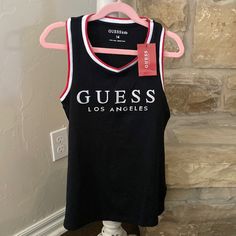 This Is A Brand New Guess Tank Top. Perfect For Summer Stretch Black Tops With Logo Print, Black Stretch Top With Logo Print, Black Cotton Tank Top With Logo Print, Black Sleeveless Top With Letter Print, Black Cotton Tank Top With Letter Print, Black Logo Print Tank Top For Summer, Girls Cuts, Guess Girl, Guess Shirt