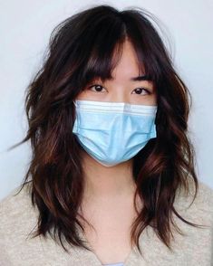 Medium-Length Shag Cut with a Middle Part Mild Shag Haircut, Korean Hair Medium Length, Choppy Shaggy Hair, Rocker Chic Hairstyle, Choppy Layers Curtain Bangs, Shag Without Bangs, Coupe Shag, Shaggy Layered Haircut, Shag Layered Hairstyles