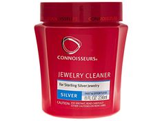 a close up of a jar of silver jewelry cleaner on a white background with clippings