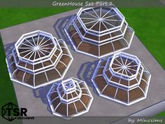 four different sized gazebos sitting on top of a cement ground