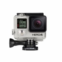 the gopro hero 4 camera is next to its protective case and lens protectors