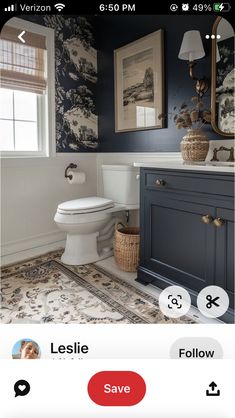 the bathroom is decorated in blue and white