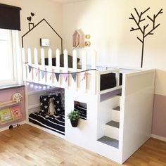 a loft bed with stairs and bunk beds for kids to sleep in is decorated with black and white trees