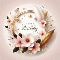 a happy birthday card with flowers and feathers on a white plate, surrounded by gold accents