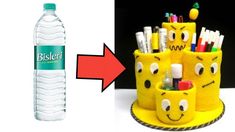 there are many pens and pencils in the holder next to a plastic water bottle