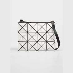 BAO BAO ISSEY MIYAKE "Lucent" faux-leather (PVC) geometric tile crossbody clutch. Adjustable shoulder strap. Lightweight, collapsible style for easy travel. Easy to clean (wipe with damp cloth); mesh lining. Recessed, extended zip top closure. Jacquard-lined interior. One zip pocket. 9"H x 13.4"W x 2"D. Made in Japan. Modern Geometric Shoulder Bag For Travel, Modern Geometric Travel Shoulder Bag, Luxury Geometric Shoulder Bag With Removable Pouch, Modern Geometric Bag With Adjustable Strap, Modern Geometric Shoulder Bag With Adjustable Strap, White Geometric Bag For Everyday Use, White Geometric Everyday Bag, Everyday Geometric White Bag, Everyday Geometric White Bags