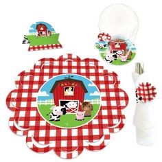 a red and white checkered tableware set with farm animals