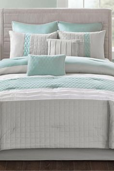 the comforter is neatly made and ready to be used in this bedding set