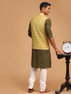 VASTRAMAY Men's Yellow Jacquard Nehru Jacket with Kurta Pyjama Set This elegant set includes a stylish yellow jacquard Nehru jacket paired with a matching kurta and pyjama, perfect for traditional and festive occasions. Designed with meticulous attention to detail, it ensures comfort and a sophisticated look. Key Features Yellow Jacquard Nehru Jacket Full-sleeve kurta with side slits Matching pyjama with drawstring closure Ideal for traditional and festive occasions Specifications Brand: VASTRAM Yellow Long Sleeve Bandhgala For Diwali, Fitted Yellow Nehru Jacket For Diwali, Yellow Fitted Nehru Jacket For Diwali, Ceremonial Embroidered Jamawar Nehru Jacket, Yellow Long Sleeve Nehru Jacket For Festivals, Traditional Gold Nehru Jacket Straight Kurta, Fitted Yellow Nehru Jacket With Long Sleeves, Churidar Material, Fitted Yellow Nehru Jacket