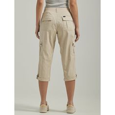 Nothing beats the comfort and style of a Lee capri. Made with modern women in mind, this cargo capri features a mid rise, relaxed fit, and Flex-to-Go waistband. Oversized front pockets, utility side pockets, and a lightweight, breathable fabric allow you to move in comfort while a wide variety of colors means there's a go-to style for everyone. Whether you're always on the go or just looking for a classic, everyday style, our Flex-to-Go Cargo capri has you covered. 98% Cotton, 2% Spandex. Pionee Breathable Summer Outfits, Capri Outfits Women Summer, Capri Outfits, Fitted Denim Jacket, Beige Outfit, Travel Outfit Summer, Everyday Chic, Womens Capris, Fashion Hacks Clothes