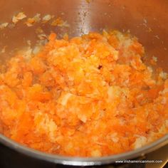 the food is being cooked in the pot on the stove