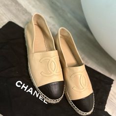 This Is An Authentic Chanel Lambskin Cc Espadrilles Size 38 In Beige And Black. These Lovely Espadrilles Are Crafted Of Soft Lambskin Leather In Beige With A Chanel Cc Patch And A Black Cap Toe. Beige Espadrilles Outfit, Chanel Espadrilles Outfit, Espadrilles Outfit, Beige Espadrilles, Chanel Espadrilles, Chanel Boots, Espadrilles Shoes, Replica Shoes, Nina Shoes