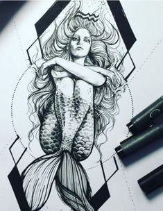 a drawing of a mermaid with long hair and a fish tail on it's back